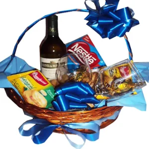 Cesta com vinho e taças